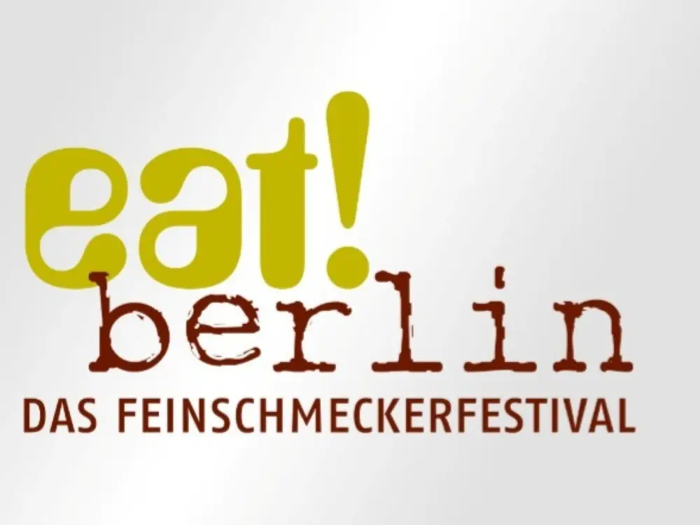 eat! berlin 2026 – Private flight from Switzerland: Logo “eat! berlin – The Gourmet Festival” on a light background.